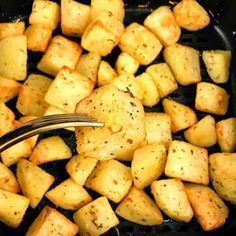 a fork with some food in it on a pan