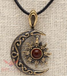 Brass Amber Day & Night or Sun and Moon pendant Height: 1.5" (40mm) Width: 0.9" (22mm) Weight 0.2oz (5g) Wax cord necklace size: approximately 19" (45 cm) in length with 2" (5 cm) extension chain, 1.5 mm in diameter Material - brass and pressed amber. Sun And Moon Pendant, Amber Day, Wax Cord Necklace, Talisman Necklace, Amber Pendant, Necklace Size, Day Night, Sun And Moon, Moon Pendant