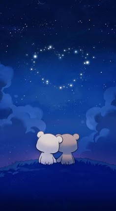 two teddy bears sitting on top of a hill under the stars