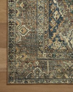 an area rug with many different colors and patterns