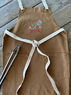 the apron is tied up and ready to be used as a grilling spatula