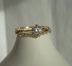 a close up of a ring on a mannequin