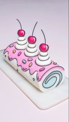 a cake with pink icing and sprinkles on it