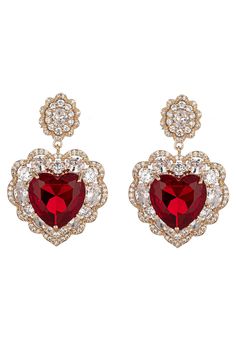 Get ready for the upcoming Valentine's Day holiday by garnering our Red Valentine Dangle Earrings! These dangle earrings boast ravishing red zirconia crystals that are encased within glimmering gold brass heart pendants for an extra special glow. Your Valentine's Day outfit is sure to be complete when you have these drop earrings on! Product Details: Material: Brass Stones: CZ crystals Measurements: approx. 1.5" length Closure: push-back Fairy Tale Jewelry, Heart Dangle Earrings, Red Jewelry, Valentine's Day Outfit, Earrings Red, Cubic Zirconia Earrings, Zirconia Earrings, Cute Earrings, Heart Design