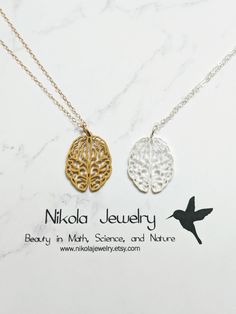 Brain Necklace in Gold or Silver Show your love for the brain! Purchase includes a natural jewelry box and gift packaging. Gift? Add-on a hummingbird card for only $7: https://www.etsy.com/listing/202506976/nikola-jewelry-hummingbird-card Add-on extender: https://www.etsy.com/listing/197483038/add-on-necklace-extender-chain-with Necklace longer than 20 inches: https://www.etsy.com/listing/196689227/extend-my-necklace-up-to-30-inches Turn pendant into a keychain or ornament: https://www.etsy.com/ Hummingbird Card, Brain Necklace, Biology Jewelry, Necklace Extender, Natural Jewelry, Packaging Gift, Human Brain, Neurology, Nature Jewelry