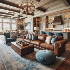 a living room filled with lots of furniture and a chandelier hanging from the ceiling