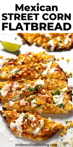 mexican street corn flatbread on a plate with lime wedges