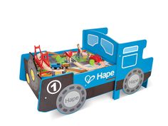 a toy truck bed with cars and people in it that is shaped like a race car