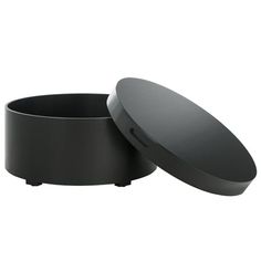 Shop Safavieh at Walmart. Save Money. Live Better. SAFAVIEH Rafaela Round Tray Top Coffee Table with Storage, Black (23 in. W x 23 in. D x 12.6 in. H) Anchor and organize your living space in style with our Rafaela tray-top coffee table with storage. The sleek and modern profile of the table packs maximum functionality to serve as a handy and welcoming addition to any room. Its cylindrical profile is updated with rich grains of wood in a sleek black finish. The top includes inset handles and can Black Round Coffee Table With Storage, Black Circle Coffee Table, Black Round Coffee Table, Oval Coffee Tables, Table With Storage, Round Tray, Top Table, Coffee Table With Storage, Gaming Console