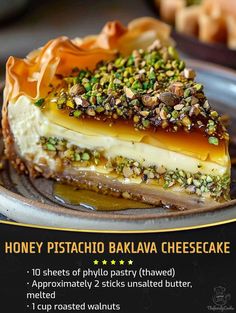 there is a piece of cheesecake on the plate with pistachio toppings