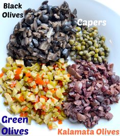 an image of different types of food on a plate with words above it that say green olives, capers, and kale