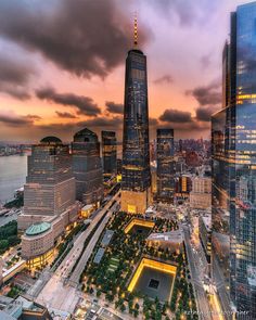 an aerial view of new york city at sunset