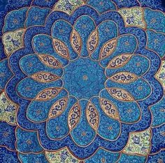 an intricate blue and gold flower design