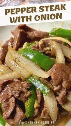 a white plate topped with beef and onions next to green peppers on top of noodles