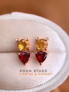 Pooh Inspired Studs lovingly designed by Love Estella Jewelry The cutest origami gemstone version of Winnie the Pooh! Set in Natural Garnet & Citrine.  Made in 925 silver plated with a thick layer of 18K Gold. Choose from three hardware - Rose Gold, Silver or Yellow Gold. Winnie The Pooh Ears, Cartoon Earrings, Pink Topaz Earrings, Cute Origami, Rose Gold Quartz, Beaded Jewels, Pink Topaz, Garnet Earrings, Disney Jewelry