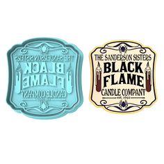 two black flame candle company tins, one is blue and the other is white