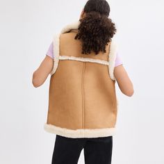 93% shearling lamb 7% leather Zip closure Slip pockets Reversible Length: 25 Model is 5'10 (178cm) chest 31 (79cm) waist 24 (61cm) hips 35 (89cm) and wears a size S Style No. CL686 Shearling Vest, Coach Outlet, Spring Tops, Spring Looks, Sweaters Knitwear, Tank Top Cami, Womens Clothing Sizes, Fun Bags, Jumpsuit Dress