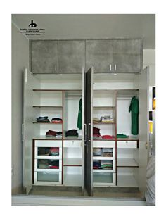 an open closet with clothes on the shelves