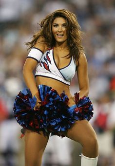 a beautiful young woman in a cheerleader outfit