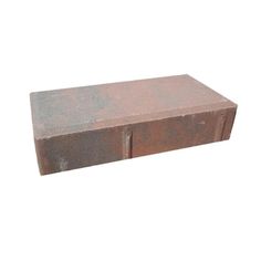 a large brick sitting on top of a white surface