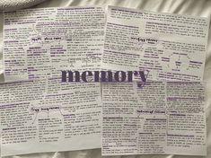 two pieces of paper with the word memory written on them, laying next to each other