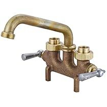 the faucet is made out of brass and has two valves on each side