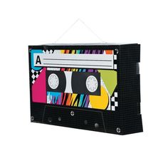 o BUDGET-FRIENDLY DECORATIONS: Add lots of character to the look of retro party decorations without spending lots of money. These cassette tapes give you more bang for your buck.
o QUALITY DECORATIONS: You don't have to pay a fortune for high quality party decorations! These cassette tapes are high quality and look great alongside any other party decorations.
o PERFECT FOR ANY EVENT: From birthday parties to school dances, these hanging decorations make the perfect party decorations. Hanging swirls are versatile and fun!
o YOUR PARTY SUPPLY HEADQUARTERS: Shop Oriental Trading for unbeatable selection and guaranteed lowest prices. From decorations to tableware to party favors and more, we can help you party for less.

Product Description:
Planning an 80s theme party, prom or celebration? Fr 80s Birthday Parties, Throwback Party, Ceiling Decorations, 80's Party, Kids Camp