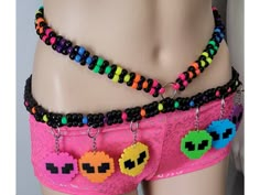 This kandi belt is made with neon pony beads and alien perlers. Glows under blacklight! Includes one kandi belt. Harness sold separately. One size fits most. This item ties in the back & around neck for easy adjusting. This Item is premade and is ready to ship! Perfect for any event! You will get lots of compliments in this unique wearable art! Stand out at your next event! Edm festival  Raves Party  Rave outfit  Festival outfit Pride Mardi gras Rave gift  Rave birthday Glow party Hypercore Outfits, Neon Rave Outfits Ideas, Edc Kandi Ideas, Kandi Leg Garter, Kandi Harness Tutorial