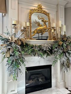 a fireplace decorated with greenery and candles