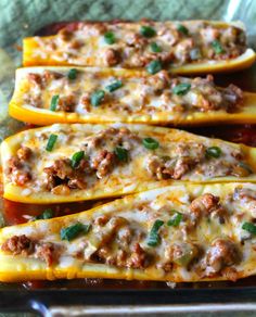 stuffed squash with meat and cheese in a baking dish