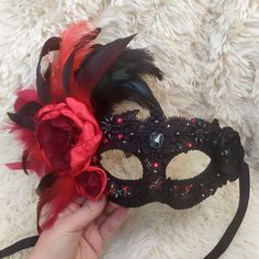 Masquerade mask in black, red and burgundy colors. The carnival mask is decorated with glass rhinestones, high-quality lace, feathers and hand-beaded lace elements. The main decoration is satin flowers with centers made of beads, rhinestones and sequins. This mask is perfect for Masquerade Ball, Carnival Party, Masquerade Wedding, Mardi Gras, Bridal Shower, Stylized Photo Shoot Dark Red Masquerade Mask, Gothic Masquerade Eye Mask For Theater, Gothic Eye Mask For Theater Masquerade, Gothic Eye Mask For Theater, Gothic Masks For Mardi Gras Theater, Gothic Masks For Theater And Mardi Gras, Gothic Masquerade Mask For Carnival, Red Costume Accessories For Carnival, Red Party Masks For Mardi Gras