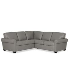 a gray leather sectional sofa on a white background