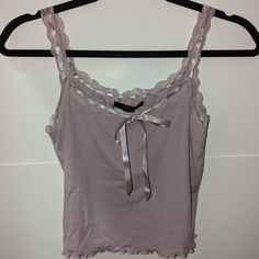 Lavender Spaghetti Strap Cropped Camisole. Size M & Size L. Never Used. Brand New. Purple Spaghetti Straps Tank Top For Spring, Purple Cami Tank Top For Spring, Purple Sleeveless Cotton Camisole, Purple Cotton Sleeveless Camisole, Purple Tank Camisole For Spring, Feminine Sleeveless Purple Top, Feminine Purple Camisole For Spring, Feminine Purple Camisole Top, Purple Cami Tank Top For Summer