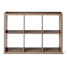 an empty wooden shelf with six shelves