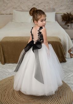 PERFECT FLOWER GIRL DRESS✨ Beautiful Baby Flower girl dress with 3D lace embroidery and amazing puffy skirt! Process time: 1-2 working days Delivery time: 2-4 working days  Also offer express overnight delivery https://www.etsy.com/listing/1298332912/express-delivery?click_key=eb8207bd8376c2fa762384c4d5701f79c6bcbc77%3A1298332912&click_sum=63123b47&ga_search_query=express&ref=shop_items_search_1&frs=1 *Train is detachable & all dresses have bow* Age 1.5 Height 86cm/34in Chest 51cm/20in Waist 51c Black Baby Dress, Flower Girl Dress Black, Open Back Dress Black, Black Open Back Dress, Toddler Wedding Dress, Baby Flower Girl Dress, Extravagant Wedding Dresses, Black And White Wedding Theme