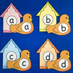 four bird themed cut outs with the letters abc and d