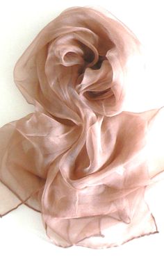 "Oblong 100% Chiffon Sheer Silk Scarf in solid color. Beautifully finished with hand-rolled edges. So soft, light and elegant it can be enjoyed all year round. Approx. 21\" x 57\" May be hand washed in cold water, hang dried and lightly ironed on low." Elegant Solid Color Silk Scarf For Summer, Elegant Solid Silk Scarf For Summer, Elegant Organza Silk Scarf For Summer, Spring Drinks, Spring Drink, Silk Chiffon Scarves, Sheer Scarf, Scarf Belt, Hand Roll