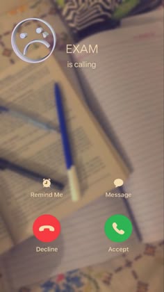 an open notebook with the text exam is calling next to it and two different icons