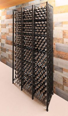 the wine rack is full of many bottles