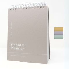 a workday planner sitting on top of a table