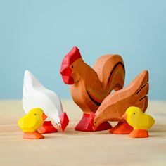 ⫸ D E S C R I P T I O N ⫷ The BumbuToys Chicken Family set features a delightful trio of handmade wooden toys: a rooster, a chicken, and a chick. This charming family is carefully crafted to bring the essence of a barnyard to children's playrooms, encouraging imaginative play and a connection to nature. ⫸ C R A F T S M A N S H I P ⫷ Each wooden toy is skillfully carved from rich, sturdy wood sourced from the resilient Maple and Oak trees. The masterful artistry behind this figurines is evident i Wood Chicken, Real Animals, Fairy Forest, Handmade Wooden Toys, Bird Figure, Fun Toys, Nature Table, Small World Play, Organic Wood