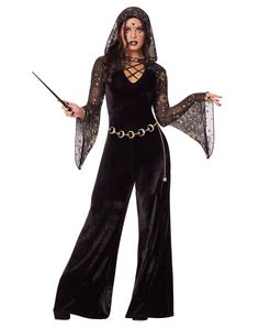 a woman in a black costume holding a wand