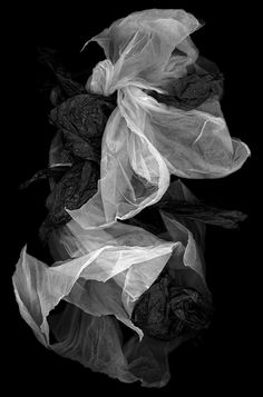 a black and white photo of some plastic bags