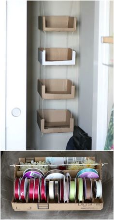 an open closet with hanging boxes on the wall