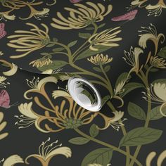 an image of a floral wallpaper with flowers and leaves on black background, close up