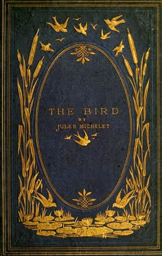 an old book with gold trimmings and birds flying around the cover, in blue