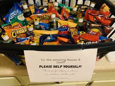 a basket filled with lots of candy and snacks