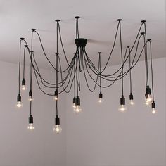 a chandelier with many bulbs hanging from it