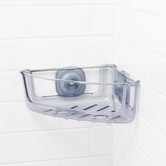 a shower caddy hanging on the wall