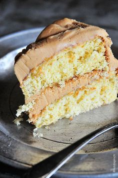 a piece of cake on a plate with a fork